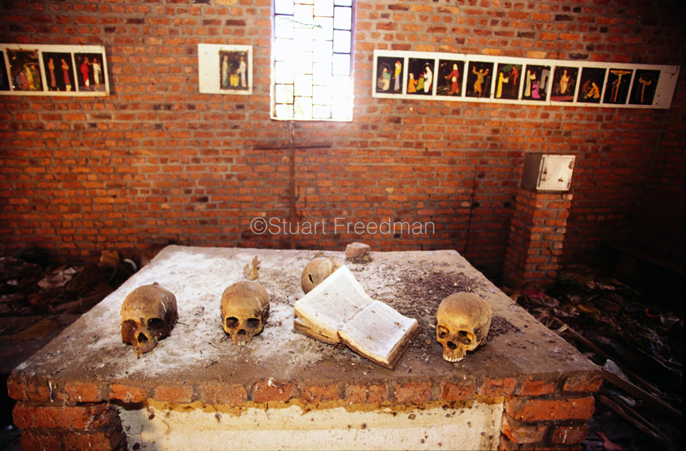 Rwanda - Ndera - Skulls on the alter of the church at Ndera, Rwanda that is now a national monument to those who were murdered inside by Hutu militias during the 1994 genocide