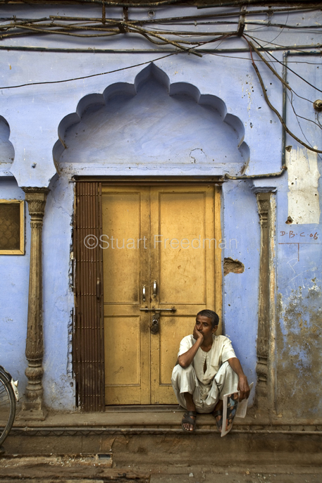 India - Delhi - A man lounges inside the remains of the Sultan Singh Ghar ki Haveli. Much of Old Delhi's historical architecture is being lost to new development. Old Delhi, India